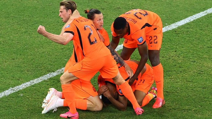 Soccer Football - FIFA World Cup 2026 - Round of 32 - Netherlands v Morocco - Estadio Monterrey, Monterrey, Mexico - June 29, 2026 Netherlands Cody Gakpo celebrates scoring their first goal with teammates REUTERS/Raquel Cunha