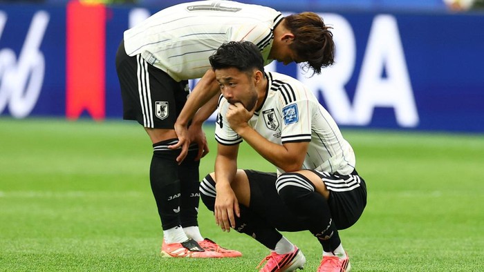 Soccer Football - FIFA World Cup 2026 - Round of 32 - Brazil v Japan - Houston Stadium, Houston, Texas, U.S. - June 29, 2026 Japans Yukinari Sugawara looks dejected after the match REUTERS/Phil Noble