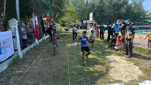Peringatan hari Bhayangkara ke-80 di Pulau Kelapa (Rizky/detikcom)