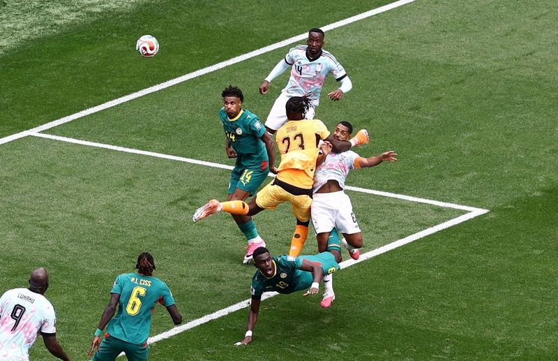 SOCCER-belgia vs senegal,youri tielemans,timnas belgia,timnas senegal,piala dunia 2026,juara bola dunia 2026-BEL-SEN/ Soccer Football - FIFA World Cup 2026 - Round of 32 - Belgium v Senegal - Seattle Stadium, Seattle, Washington, U.S. - July 1, 2026 Belgium's Youri Tielemans scores their second goal past Senegal's Mory Diaw REUTERS/Lee Smith TPX IMAGES OF THE DAY
