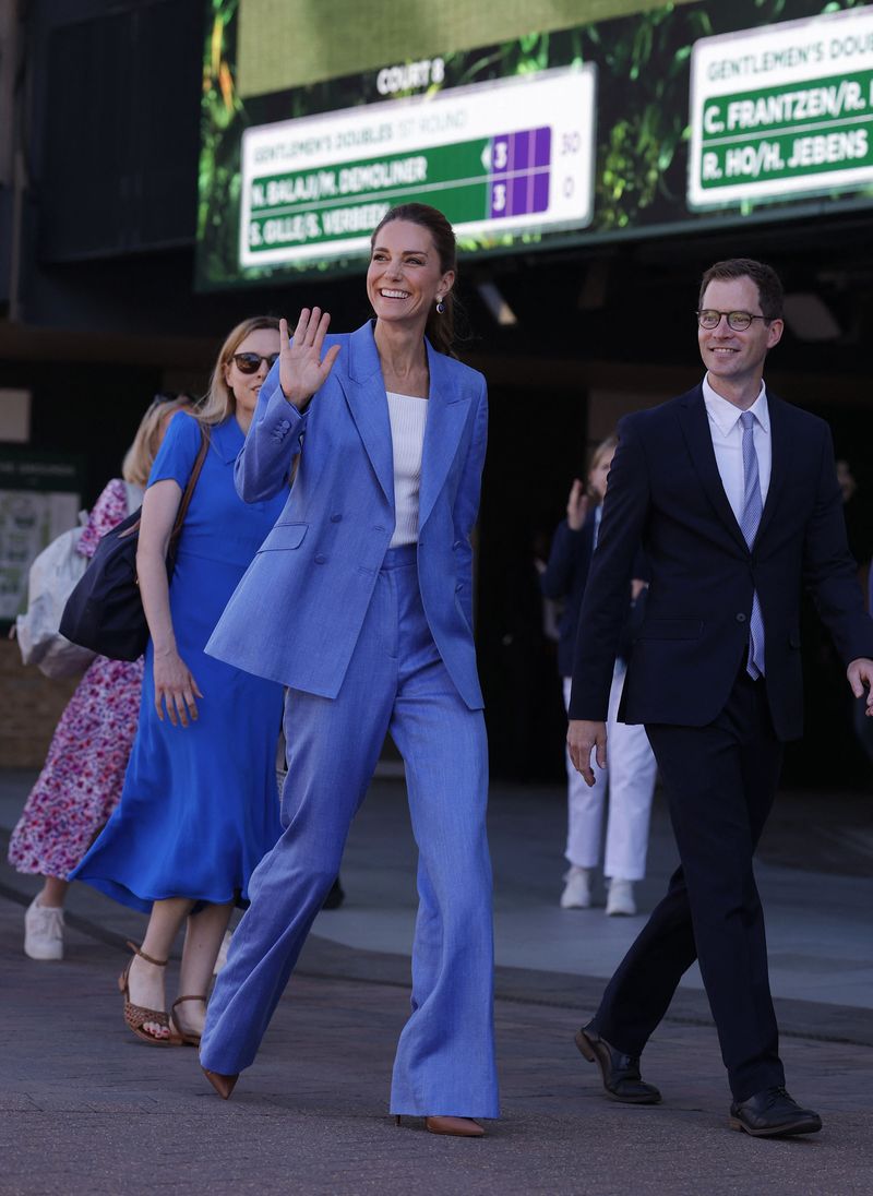 Tennis - Wimbledon - All England Lawn Tennis and Croquet Club, London, Britain - July 2, 2026 Britain's Catherine, Princess of Wales walks through Wimbledon REUTERS/Andrew Couldridge