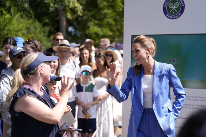 Tennis - Wimbledon - All England Lawn Tennis and Croquet Club, London, Britain - July 2, 2026 Britains Catherine, Princess of Wales walks through Wimbledon REUTERS/Andrew Couldridge