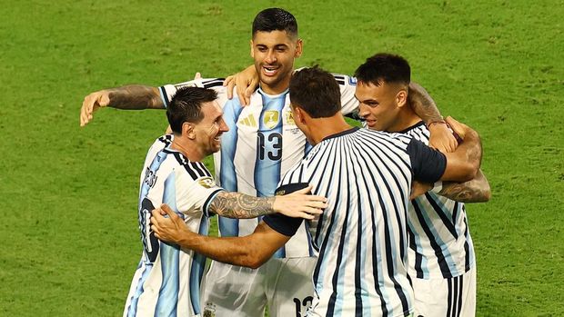 Cristian Romero Soccer Football - FIFA World Cup 2026 - Round of 32 - Argentina v Cape Verde - Miami Stadium, Miami Gardens, Florida, U.S. - July 3, 2026 Argentina's Cristian Romero celebrates scoring their third goal with teammates REUTERS/Marco Bello