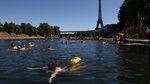 Saat Paris Memanas, Sungai Seine Menjadi Pelarian Warga