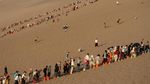 Fenomena Gunung Pasir Bernyanyi di Gurun Gobi Tarik Minat Wisatawan