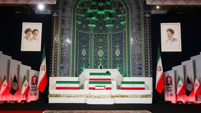 The coffins of Irans late Supreme Leader Ayatollah Ali Khamenei and his family members are displayed on the day international delegates participate in a farewell ceremony for Khamenei, who was killed on February 28 during Israeli and U.S. airstrikes