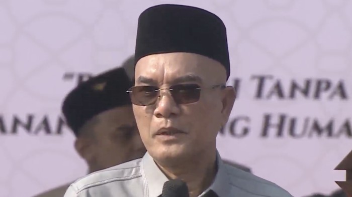 Ketua Komisi VIII DPR RI, Marwan Dasopang, saat pembukaan Rapat Kerja Nasional Evaluasi Penyelenggaraan Ibadah Haji 1447 H/2026 M di Lapangan Makodau I, Pondok Gede, Jakarta Timur, Sabtu (4/7/2026).