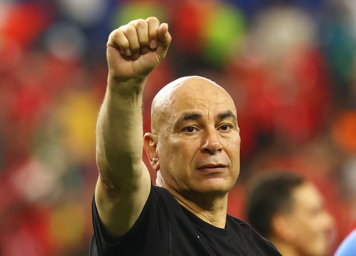 Soccer Football - FIFA World Cup 2026 - Round of 32 - Australia v Egypt - Dallas Stadium, Arlington, Texas, U.S. - July 3, 2026 Egypt coach Hossam Hassan celebrates after the match as Egypt qualify for the Round of 16 stage of the World Cup REUTERS/Kai Pfaffenbach