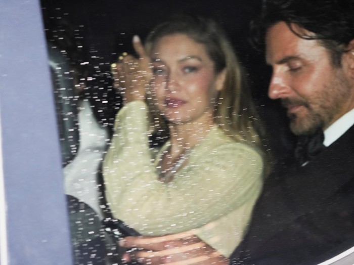 Gigi Hadid and Bradley Cooper depart Madison Square Garden, the venue for the wedding celebrations of singer Taylor Swift and National Football League (NFL) player Travis Kelce, in New York, U.S., July 4, 2026.  REUTERS/Bing Guan