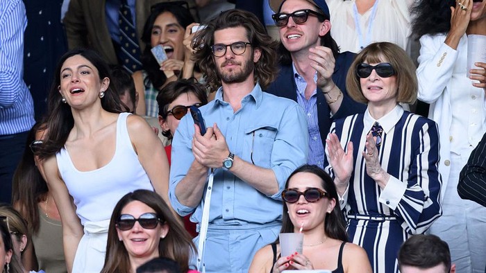 LONDON, ENGLAND - JULY 04: Monica Barbaro, Andrew Garfield and Anna Wintour during day six of the 2026 Wimbledon Tennis Championships at All England Lawn Tennis and Croquet Club on July 04, 2026 in London, England. (Photo by Karwai Tang/WireImage)