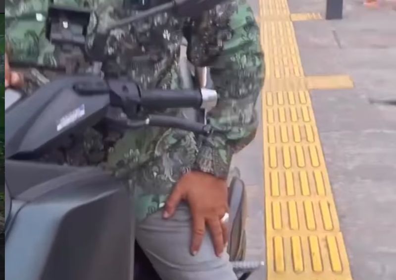 Video pemotor mengaku sebagai tentara saat ditegur karena melaju di trotoar di Depok viral di medsos. Pihak TNI memastikan pemotor tersebut bukan tentara. (dok Ist/repro)