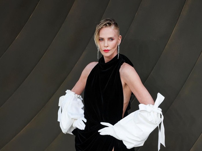 Cast member Charlize Theron attends the The Odyssey world premiere in London, Britain, July 6, 2026. REUTERS/Isabel Infantes