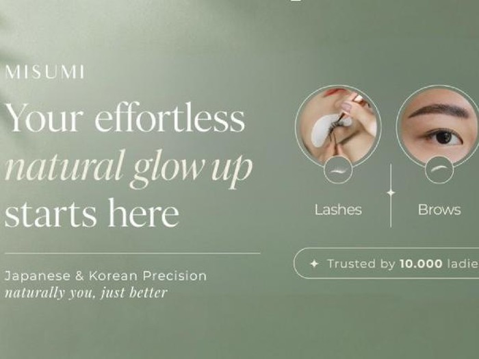 Beautiful Woman with long eyelashes in a beauty salon. Eyelash extension procedure. Cosmetology skin care