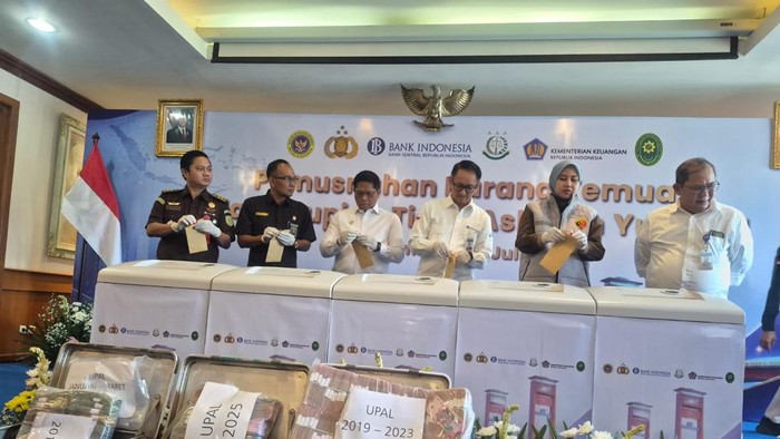 Pemusnahan uang palsu di Sumsel.