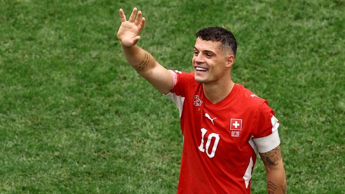 Soccer Football - FIFA World Cup 2026 - Round of 16 - Switzerland v Colombia - BC Place, Vancouver, Canada - July 7, 2026 Switzerlands Granit Xhaka celebrates after the match as Switzerland qualify for the quarter finals of the World Cup REUTERS/Lee