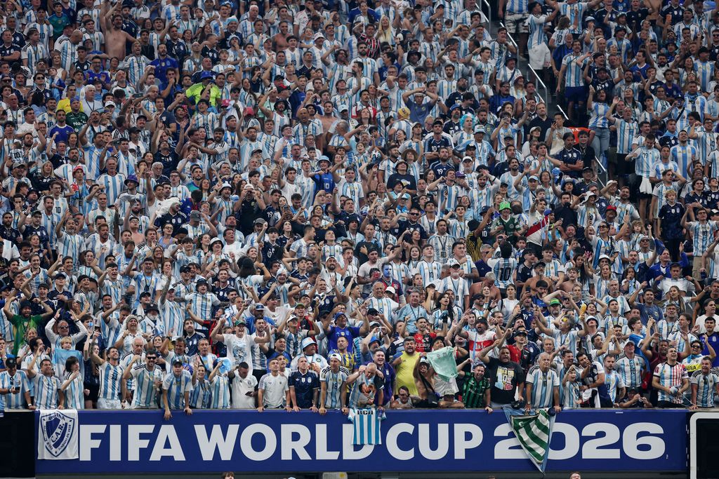 Soccer Football - FIFA World Cup 2026 - Round of 16 - Argentina v Egypt - Atlanta Stadium, Atlanta, Georgia, U.S. - July 7, 2026 Argentina fans celebrate in the stands after Enzo Fernandez scores their third goal REUTERS/Paul Childs