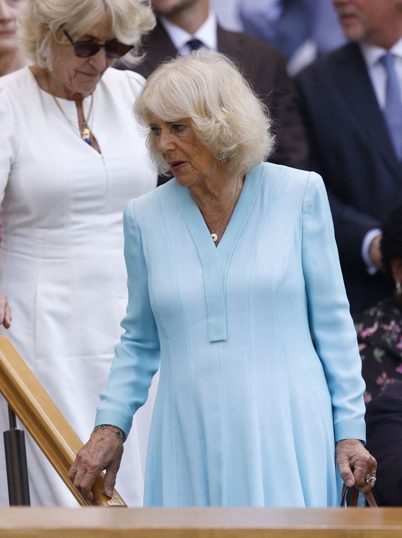 Tennis - Wimbledon - All England Lawn Tennis and Croquet Club, London, Britain - July 8, 2026 Britain's Queen Camilla in the Royal Box after the quarter final match between Ukraine's Marta Kostyuk and Italy's Jasmine Paolini REUTERS/Andrew Couldridge
