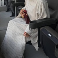 Dikenal sebagai konten kreator, Rima Edbouche Dembele membagikan foto estetik gayanya saat berada di bangku penonton Piala Dunia 2026. Lagi-lagi foto tersebut ditampilkan tanpa ada foto wajahnya. Foto: Dok. Instagram VogueMagazine, Rima Edbouche