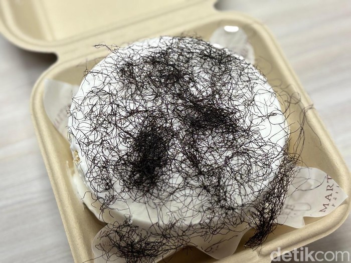 Kue bento topping mirip rambut kemaluan