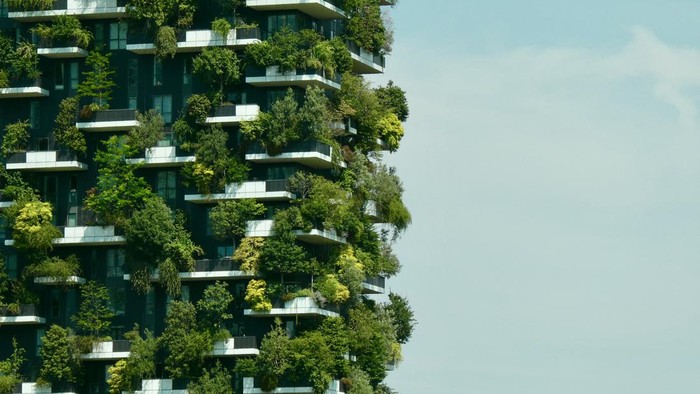 Skyscraper with trees on balconies