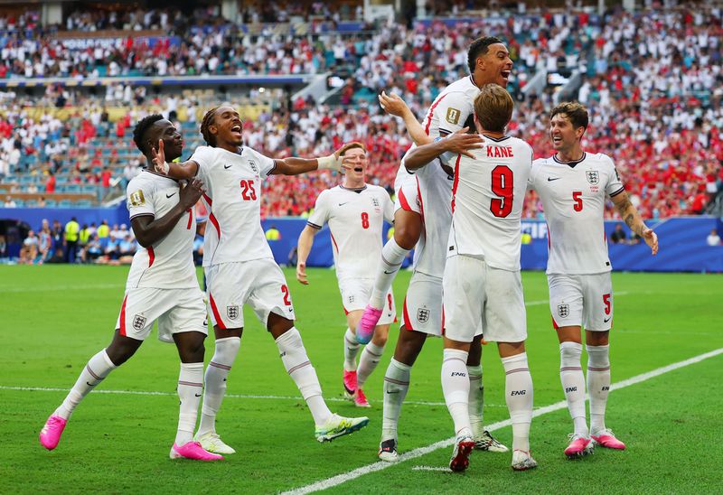 SOCCER-WORLDCUP-NOR-ENG/ Soccer Football - FIFA World Cup 2026 - Quarter Final - Norway v England - Miami Stadium, Miami Gardens, Florida, U.S. - July 11, 2026 England's Jude Bellingham celebrates scoring their second goal with teammates REUTERS/Mike Segar