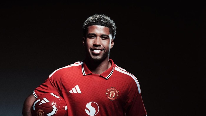 MANCHESTER, ENGLAND - JULY 13: (EXCLUSIVE COVERAGE) Andrey Santos of Manchester United poses after signing for the club at Carrington Training Ground on July 13, 2026 in Manchester, England. (Photo by Manchester United/Manchester United via Getty Images)
