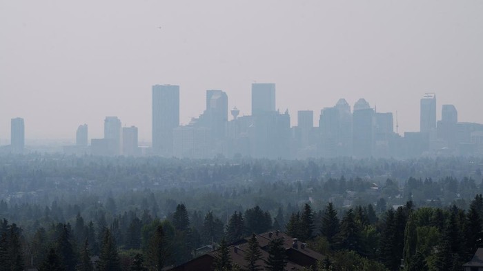 Forest fire smoke blankets the city prompting a yellow warning air quality alert in Calgary, Alberta, Canada June 30, 2026.  REUTERS/Todd Korol