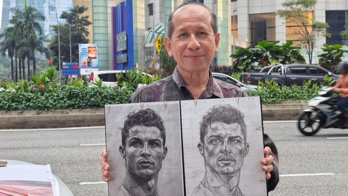 Kalau kamu mampir ke Malaysia, tepatnya di sekitaran Menara Petronas, mampir ke Jalan Ampang, deh. Kamu bisa ketemu dengan Uncle Wan yang jago banget gambar pakai iPad.