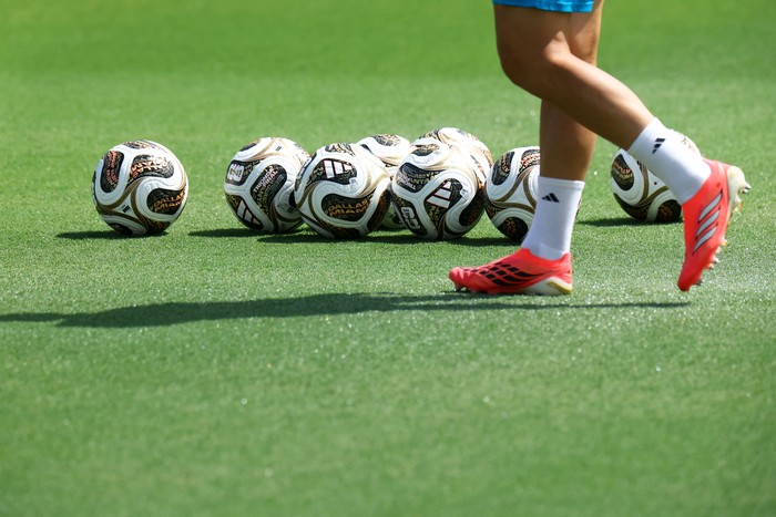 Soccer Football - FIFA World Cup 2026 - Spain Training - Cotton Bowl Stadium, Dallas, Texas, U.S. - July 12, 2026 The new adidas Trionda Final ball, the official match mall for the semi-finals, the third-place play-off and final of the FIFA World Cup are pictured on the pitch during training REUTERS/Hannah Mckay