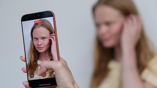 Anastasia Kostromitina, model of MOTION agency, who has gone viral with striking likeness to Norway's Erling Haaland, poses in Moscow, Russia July 10, 2026.  REUTERS/Ramil Sitdikov