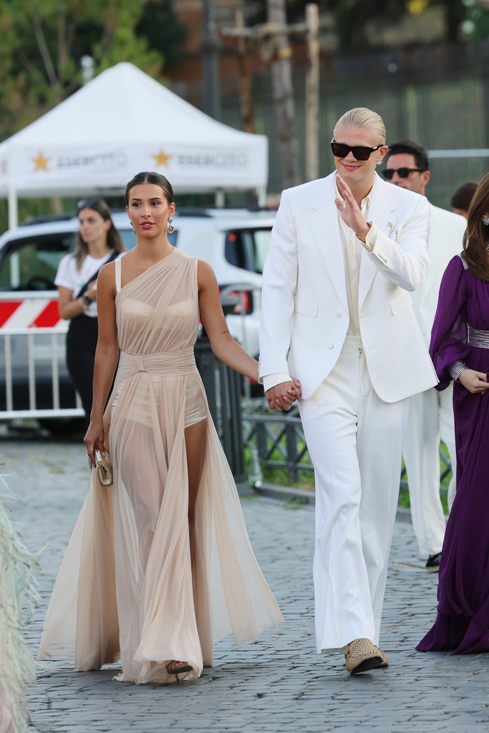 ROME, ITALY - JULY 14: Isabel Haugseng Johansen and Erling Haaland are seen outside the Dolce & Gabbana Alta Moda fashion show at Foro Romano on July 14, 2025 in Rome, Italy. (Photo by Vittorio Zunino Celotto/GC Images)