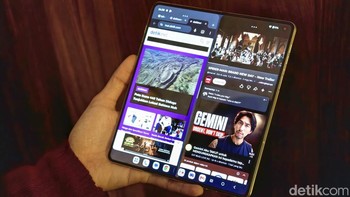 Fitur split-screen memudahkan pengguna menjalankan dua aplikasi secara bersamaan pada layar utama Motorola Razr Fold. Foto: Adi FR/detikINET