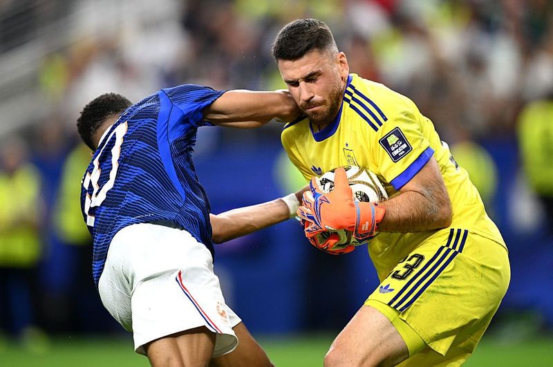 Unai Simon ARLINGTON, TEXAS - JULY 14: Unai Simon #23 of Spain makes a save against Kylian Mbappe #10 of France during the FIFA World Cup 2026 Semi Final match between France and Spain at Dallas Stadium on July 14, 2026 in Arlington, Texas. Mbappe was shown a yellow card on the play. (Photo by Hannah Peters - FIFA/FIFA via Getty Images)