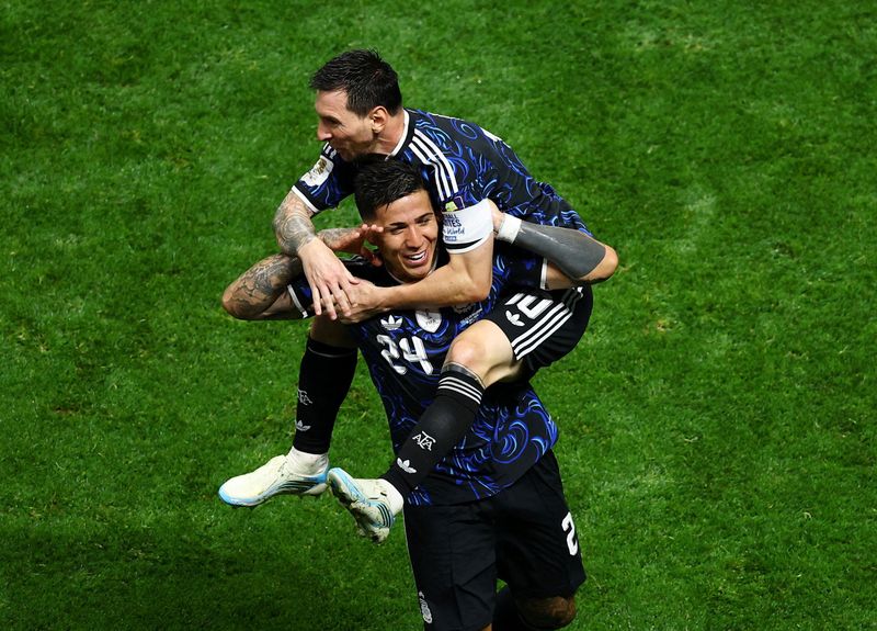 Lionel Messi Soccer Football - FIFA World Cup 2026 - Semi Final - England v Argentina - Atlanta Stadium, Atlanta, Georgia, U.S. - July 15, 2026 Argentina's Enzo Fernandez celebrates scoring their first goal with Lionel Messi REUTERS/Carlos Barria TPX IMAGES OF THE DAY