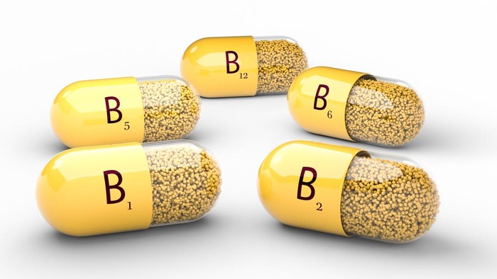 Vitamin B. B1 B2 B6 B12 capsules on a white isolated background. 3d illustration