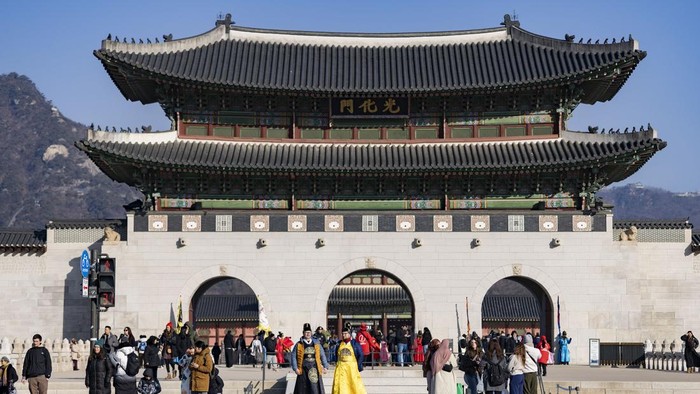 A man takes a photo in Gyeongbokgung Palace in Seoul, South Korea, on May 2, 2026. Gyeongbokgung Palace is the primary palace of the Joseon dynasty, established in 1395 after the foundation of the dynasty in 1392. (Photo by Kichul Shin/NurPhoto via G