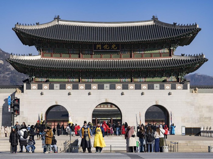 A man takes a photo in Gyeongbokgung Palace in Seoul, South Korea, on May 2, 2026. Gyeongbokgung Palace is the primary palace of the Joseon dynasty, established in 1395 after the foundation of the dynasty in 1392. (Photo by Kichul Shin/NurPhoto via Getty Images)