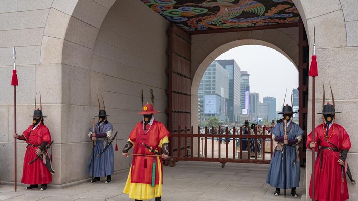 A man takes a photo in Gyeongbokgung Palace in Seoul, South Korea, on May 2, 2026. Gyeongbokgung Palace is the primary palace of the Joseon dynasty, established in 1395 after the foundation of the dynasty in 1392. (Photo by Kichul Shin/NurPhoto via Getty Images)
