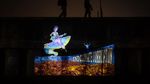 Warga Terpukau, Festival Dadap Vol. 5 Hadirkan Pesona Video Mapping di Tanggul Laut