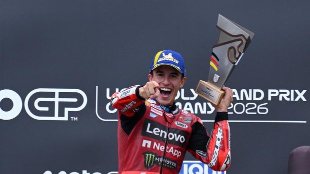 Marc Marquez MotoGP - German Grand Prix - Sachsenring, Hohenstein-Ernstthal, Germany - July 12, 2026 Ducati Lenovo Team's Marc Marquez celebrates on the podium after winning the MotoGP race REUTERS/Annegret Hilse