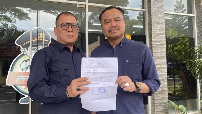 Foto: Ketua PWI Sumut saat melaporkan ke Polda Sumut (Mhd Ilham Pradilla/detikSumut)