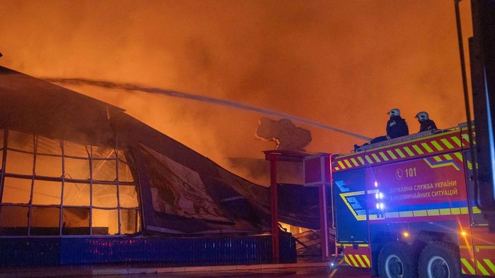 A firefighter works at the site of a household item shopping mall which was hit by a Russian drone strike, amid Russia's attack on Ukraine, in Sumy, Ukraine in this handout picture released July 21, 2026. Press service of the State Emergency Service of Ukraine in Sumy region/Handout via REUTERS ATTENTION EDITORS - THIS IMAGE HAS BEEN SUPPLIED BY A THIRD PARTY. DO NOT OBSCURE LOGO.    /Handout via REUTERS    THIS IMAGE HAS BEEN SUPPLIED BY A THIRD PARTY