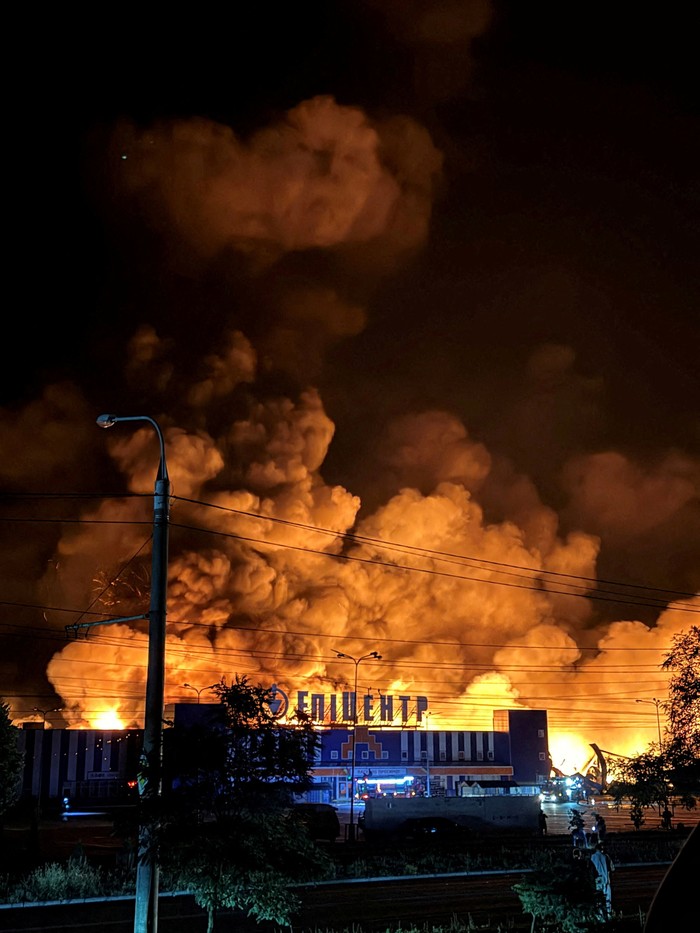 A firefighter works at the site of a household item shopping mall which was hit by a Russian drone strike, amid Russia's attack on Ukraine, in Sumy, Ukraine in this handout picture released July 21, 2026. Press service of the State Emergency Service of Ukraine in Sumy region/Handout via REUTERS ATTENTION EDITORS - THIS IMAGE HAS BEEN SUPPLIED BY A THIRD PARTY. DO NOT OBSCURE LOGO.    /Handout via REUTERS    THIS IMAGE HAS BEEN SUPPLIED BY A THIRD PARTY