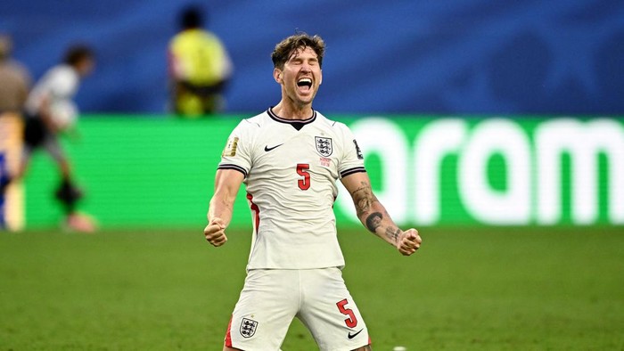 Soccer Football - FIFA World Cup 2026 - Quarter Final - Norway v England - Miami Stadium, Miami Gardens, Florida, U.S. - July 11, 2026 Englands John Stones celebrates after the match as England qualify for the semi finals of the World Cup REUTERS/Dylan Martinez