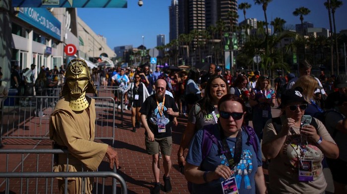 Attendees arrive for the opening day of Comic-Con International in San Diego, California, U.S. July 23, 2026. REUTERS/Daniel Cole