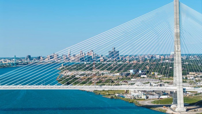 Jembatan Gordie Howe Senilai Rp76 T Siap Hubungkan Kanada dan AS A drone view shows the $4.7 billion Gordie Howe International Bridge, connecting Windsor, Ontario and Detroit, Michigan, ahead of its opening, in Windsor, Ontario, Canada, July 23, 2026. REUTERS/Carlos Osorio