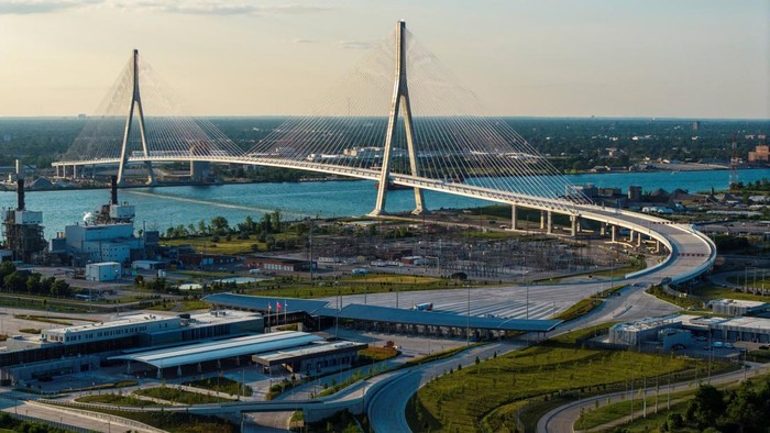 Jembatan Gordie Howe Senilai Rp76 T Siap Hubungkan Kanada dan AS A drone view shows the $4.7 billion Gordie Howe International Bridge, connecting Windsor, Ontario and Detroit, Michigan, ahead of its opening, in Windsor, Ontario, Canada, July 23, 2026. REUTERS/Carlos Osorio