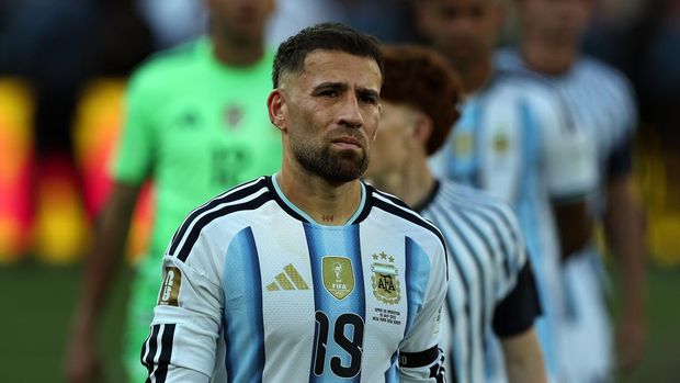 EAST RUTHERFORD, NEW JERSEY - JULY 19: Nicolas Otamendi of Argentina looks dejected at full time after being defeated  1-0 AET during the FIFA World Cup 2026 Final match between Spain and Argentina at New York New Jersey Stadium on July 19, 2026 in East Rutherford, New Jersey. (Photo by Ian MacNicol/Getty Images)