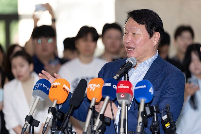 Chey Tae-won, chairman of SK Group, speaks alongside Jensen Huang, right, CEO of NVIDIA, during a media briefing on AI and semiconductor cooperation between NVIDIA and SK Group at SK Seorin Building in Seoul, South Korea, on June 8, 2026. (Photo by Chris Jung/NurPhoto via Getty Images)