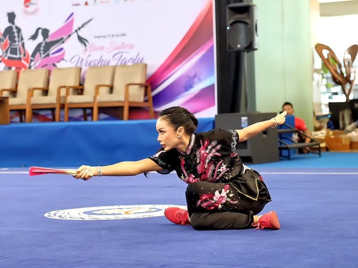 Kris Dayanti mengikuti kejuaraan nasional wushu.